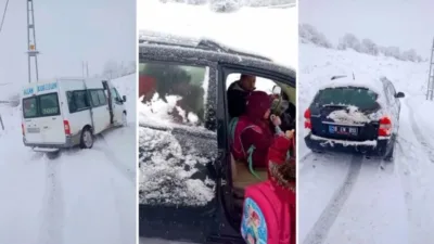 Giresun’un Çamoluk ilçesinde kar yağışı nedeniyle yolda kalan öğrenci servisine